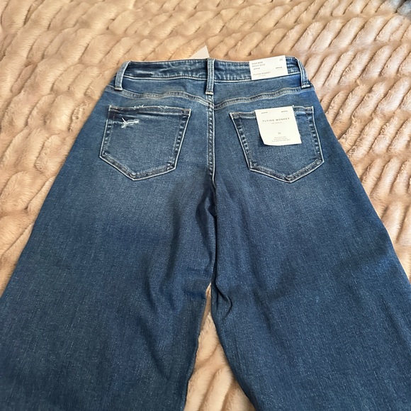 Wide-Leg Distressed Blue Jeans with wide cuff - Picture 3 of 5